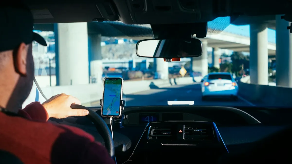 Driver in a car with a phone navigation app mounted on the dashboard